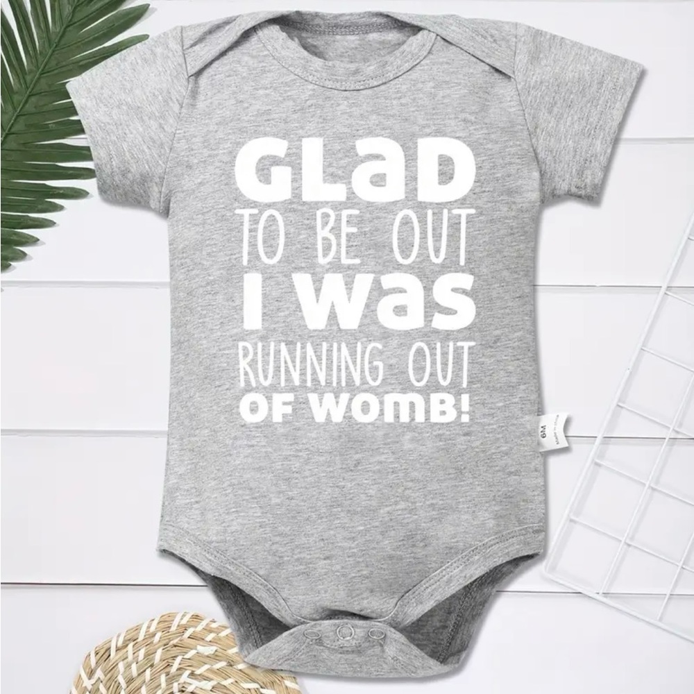 Glad to be out I was running out of womb onesie